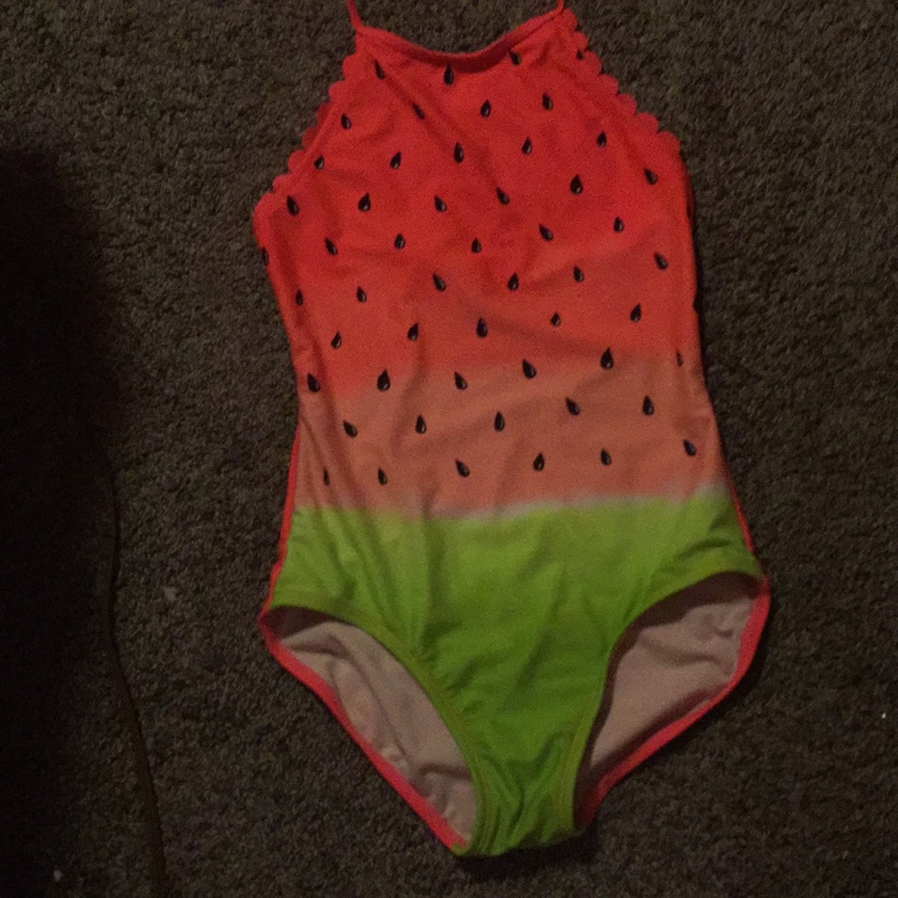 A watermelon bathing suit with a tiny skirt